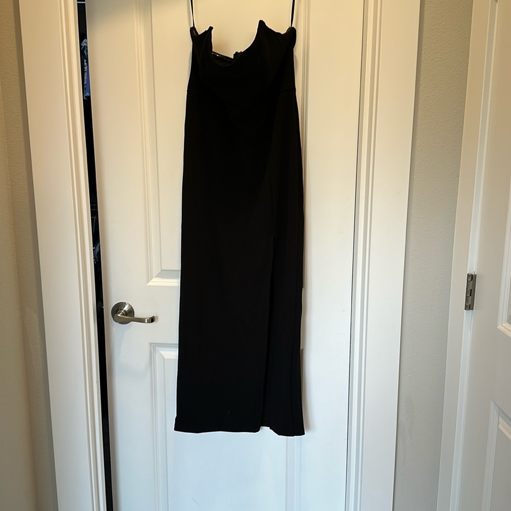Worn once to wedding in March 2024. Black strapless size L hello Molly dress.